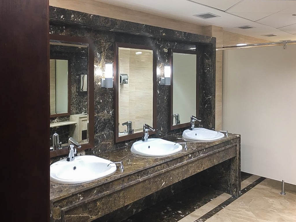 Modern sink and countertop installation in Maadi office building bathroom renovation