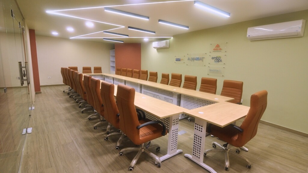 Corporate training room with custom furnishings and modern finishes in 5th Settlement office basement