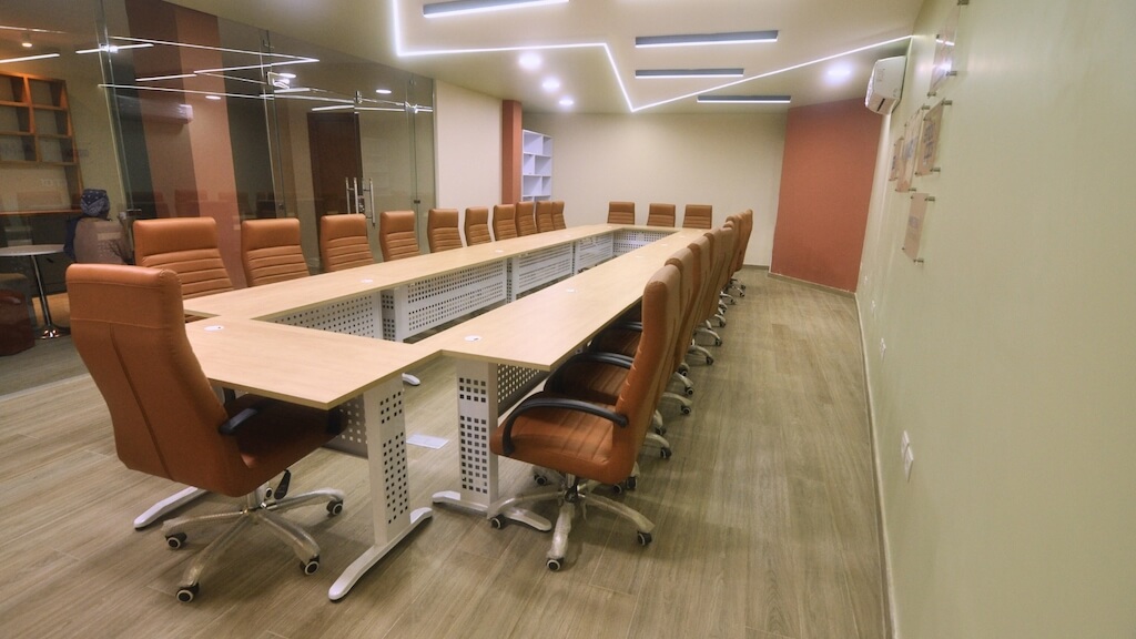 Corporate training room with custom furnishings and modern finishes in 5th Settlement office basement